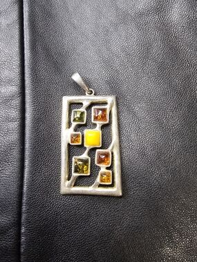 Handcrafted Sterling Silver Pendant with Amber Gemstones